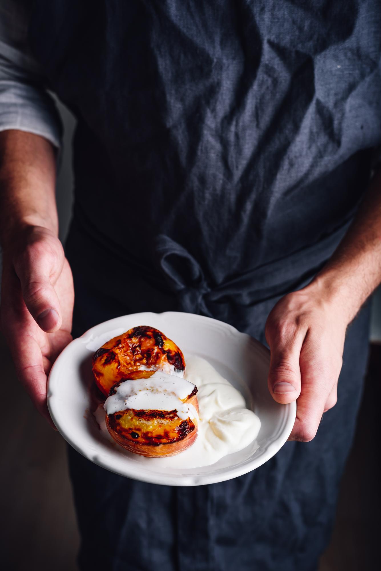 Chef preparing a rustic dish in a calm kitchen